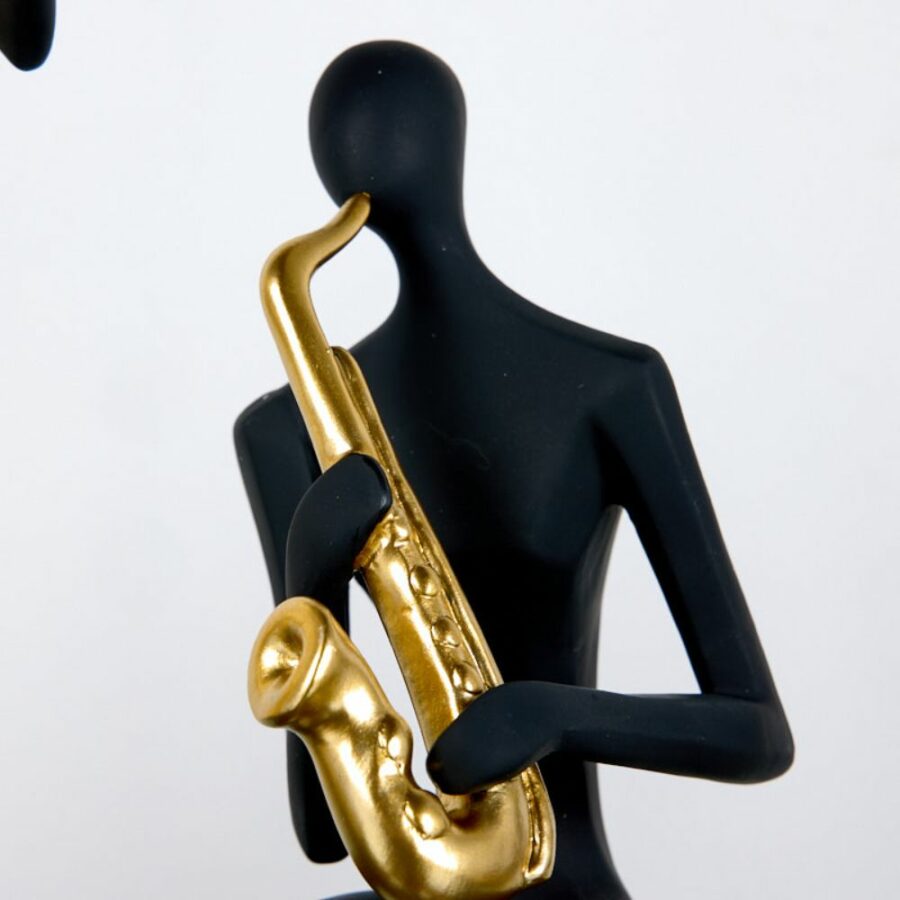 Figuras de músicos de resina negro y dorado