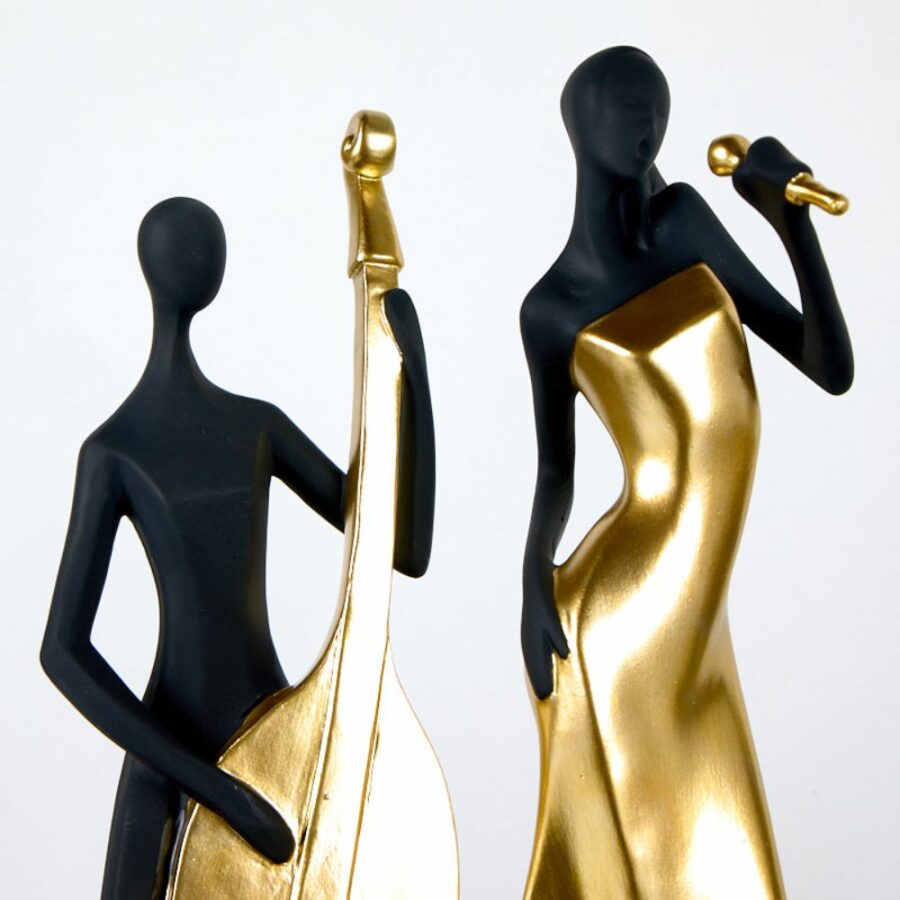 Figuras de músicos de resina negro y dorado